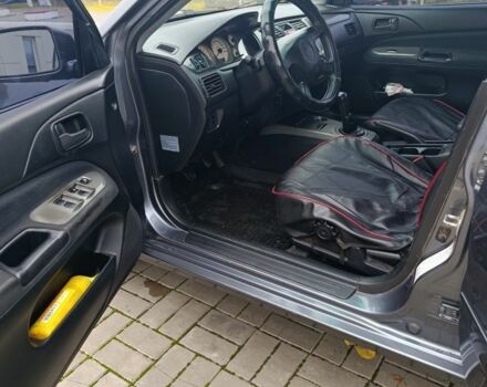 Серый Мицубиси Лансер, объемом двигателя 1.6 л и пробегом 100 тыс. км за 3500 $, фото 6 на Automoto.ua