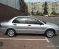 Серый Мицубиси Лансер, объемом двигателя 1.6 л и пробегом 155 тыс. км за 5500 $, фото 1 на Automoto.ua