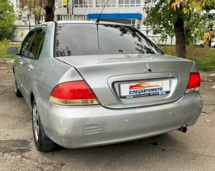 Мицубиси Лансер 2005 в Киеве на Automoto.ua Серый Мицубиси Лансер, объемом двигателя 1.58 л и пробегом 180 тыс. км за 2490 $, фото 12 на Automoto.ua