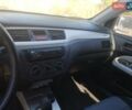 Сірий Міцубісі Lancer, об'ємом двигуна 1.6 л та пробігом 244 тис. км за 3300 $, фото 9 на Automoto.ua