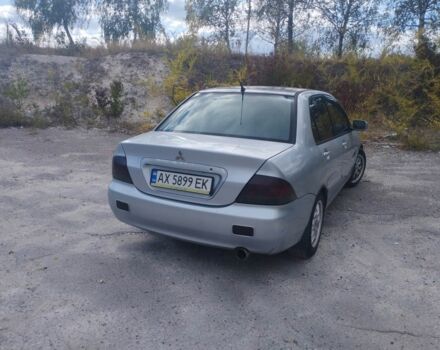 Сірий Міцубісі Lancer, об'ємом двигуна 1.6 л та пробігом 244 тис. км за 3300 $, фото 4 на Automoto.ua