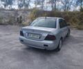 Сірий Міцубісі Lancer, об'ємом двигуна 1.6 л та пробігом 244 тис. км за 3300 $, фото 4 на Automoto.ua