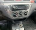 Сірий Міцубісі Lancer, об'ємом двигуна 1.58 л та пробігом 200 тис. км за 4000 $, фото 5 на Automoto.ua
