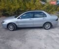 Сірий Міцубісі Lancer, об'ємом двигуна 1.6 л та пробігом 244 тис. км за 3300 $, фото 5 на Automoto.ua