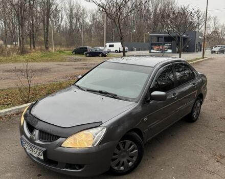 Сірий Міцубісі Lancer, об'ємом двигуна 1.6 л та пробігом 230 тис. км за 2799 $, фото 3 на Automoto.ua