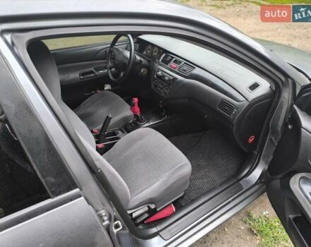 Сірий Міцубісі Lancer, об'ємом двигуна 1.6 л та пробігом 257 тис. км за 3700 $, фото 13 на Automoto.ua