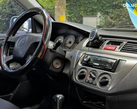 Мицубиси Лансер 2005 в Киеве на Automoto.ua Серый Мицубиси Лансер, объемом двигателя 1.6 л и пробегом 196 тыс. км за 4490 $, фото 26 на Automoto.ua