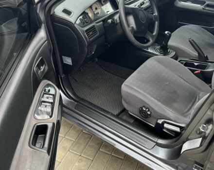 Сірий Міцубісі Lancer, об'ємом двигуна 1.6 л та пробігом 231 тис. км за 3500 $, фото 5 на Automoto.ua