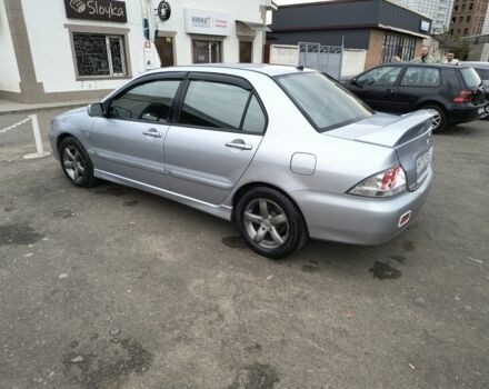 Серый Мицубиси Лансер, объемом двигателя 2 л и пробегом 212 тыс. км за 4300 $, фото 6 на Automoto.ua