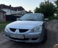 Сірий Міцубісі Lancer, об'ємом двигуна 1.6 л та пробігом 262 тис. км за 3200 $, фото 1 на Automoto.ua