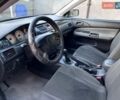 Серый Мицубиси Лансер, объемом двигателя 1.58 л и пробегом 290 тыс. км за 4000 $, фото 4 на Automoto.ua