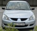 Сірий Міцубісі Lancer, об'ємом двигуна 1.6 л та пробігом 250 тис. км за 3997 $, фото 1 на Automoto.ua
