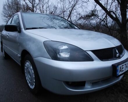 Серый Мицубиси Лансер, объемом двигателя 1.6 л и пробегом 235 тыс. км за 2850 $, фото 19 на Automoto.ua