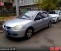 Сірий Міцубісі Lancer, об'ємом двигуна 1.6 л та пробігом 360 тис. км за 1999 $, фото 5 на Automoto.ua