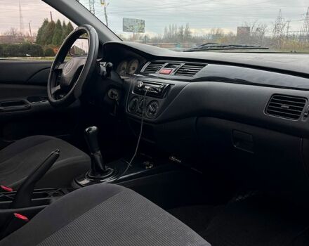 Сірий Міцубісі Lancer, об'ємом двигуна 1.6 л та пробігом 236 тис. км за 3800 $, фото 10 на Automoto.ua