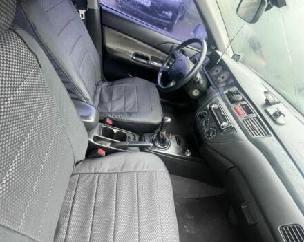 Серый Мицубиси Лансер, объемом двигателя 1.6 л и пробегом 200 тыс. км за 3906 $, фото 6 на Automoto.ua