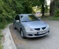Серый Мицубиси Лансер, объемом двигателя 1.6 л и пробегом 300 тыс. км за 3950 $, фото 1 на Automoto.ua