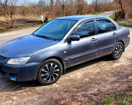 Сірий Міцубісі Lancer, об'ємом двигуна 1.6 л та пробігом 309 тис. км за 3350 $, фото 4 на Automoto.ua