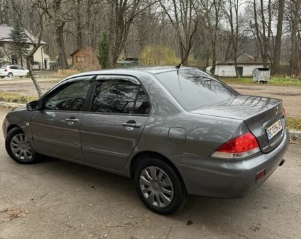 Сірий Міцубісі Lancer, об'ємом двигуна 1.6 л та пробігом 230 тис. км за 2799 $, фото 12 на Automoto.ua