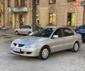 Серый Мицубиси Лансер, объемом двигателя 1.58 л и пробегом 200 тыс. км за 3850 $, фото 1 на Automoto.ua