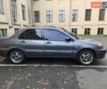 Серый Мицубиси Лансер, объемом двигателя 1.58 л и пробегом 293 тыс. км за 4000 $, фото 19 на Automoto.ua