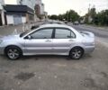 Сірий Міцубісі Lancer, об'ємом двигуна 2 л та пробігом 210 тис. км за 3999 $, фото 4 на Automoto.ua