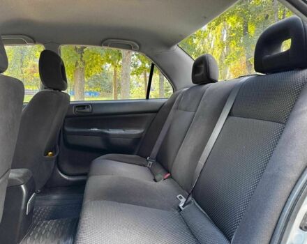 Серый Мицубиси Лансер, объемом двигателя 1.6 л и пробегом 196 тыс. км за 4390 $, фото 22 на Automoto.ua