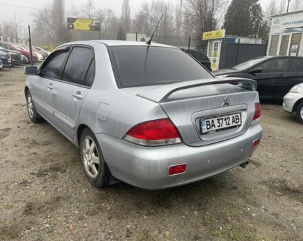 Серый Мицубиси Лансер, объемом двигателя 1.6 л и пробегом 200 тыс. км за 3906 $, фото 1 на Automoto.ua