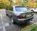 Серый Мицубиси Лансер, объемом двигателя 1.58 л и пробегом 293 тыс. км за 4000 $, фото 1 на Automoto.ua