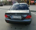 Серый Мицубиси Лансер, объемом двигателя 1.6 л и пробегом 416 тыс. км за 4000 $, фото 1 на Automoto.ua