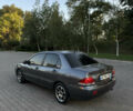 Сірий Міцубісі Lancer, об'ємом двигуна 1.58 л та пробігом 263 тис. км за 4099 $, фото 4 на Automoto.ua