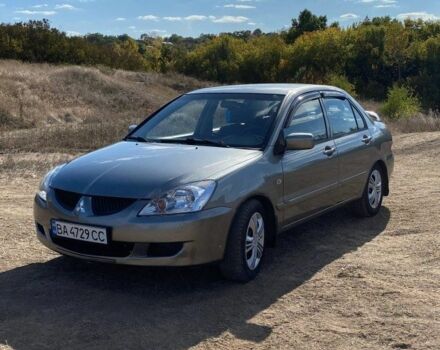 Сірий Міцубісі Lancer, об'ємом двигуна 1.6 л та пробігом 264 тис. км за 5000 $, фото 3 на Automoto.ua