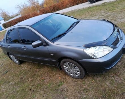 Міцубісі Lancer 2005 у Кам'янське (Дніпродзержинськ) на Automoto.ua Сірий Міцубісі Lancer, об'ємом двигуна 1.6 л та пробігом 220 тис. км за 4100 $, фото 9 на Automoto.ua