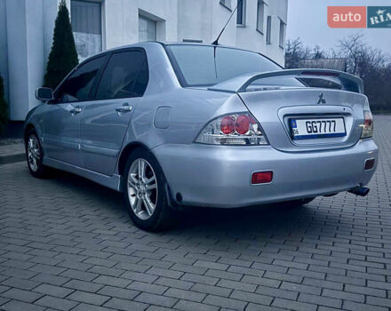 Сірий Міцубісі Lancer, об'ємом двигуна 2 л та пробігом 187 тис. км за 4600 $, фото 6 на Automoto.ua