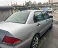Сірий Міцубісі Lancer, об'ємом двигуна 1.6 л та пробігом 228 тис. км за 2854 $, фото 4 на Automoto.ua