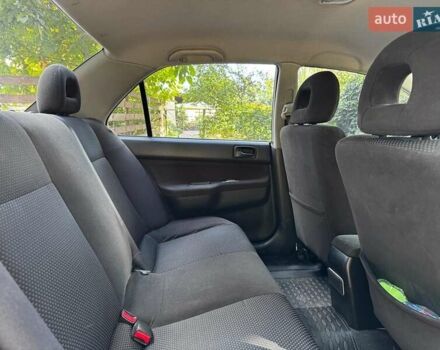 Серый Мицубиси Лансер, объемом двигателя 1.6 л и пробегом 196 тыс. км за 4490 $, фото 23 на Automoto.ua