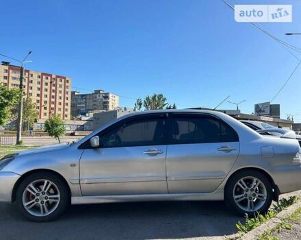 Сірий Міцубісі Lancer, об'ємом двигуна 2 л та пробігом 165 тис. км за 5000 $, фото 6 на Automoto.ua