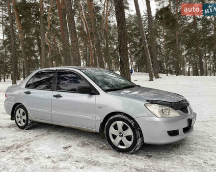Серый Мицубиси Лансер, объемом двигателя 1.58 л и пробегом 225 тыс. км за 3950 $, фото 5 на Automoto.ua