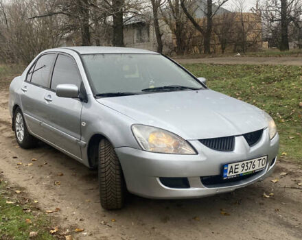 Серый Мицубиси Лансер, объемом двигателя 1.58 л и пробегом 210 тыс. км за 3900 $, фото 6 на Automoto.ua