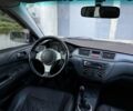 Серый Мицубиси Лансер, объемом двигателя 2 л и пробегом 260 тыс. км за 3400 $, фото 18 на Automoto.ua