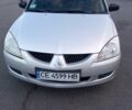 Сірий Міцубісі Lancer, об'ємом двигуна 1.6 л та пробігом 214 тис. км за 3637 $, фото 1 на Automoto.ua