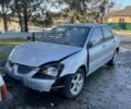 Серый Мицубиси Лансер, объемом двигателя 1.6 л и пробегом 158 тыс. км за 1100 $, фото 1 на Automoto.ua