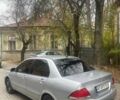 Сірий Міцубісі Lancer, об'ємом двигуна 1.58 л та пробігом 315 тис. км за 2350 $, фото 1 на Automoto.ua