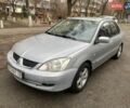 Сірий Міцубісі Lancer, об'ємом двигуна 1.58 л та пробігом 281 тис. км за 3250 $, фото 3 на Automoto.ua