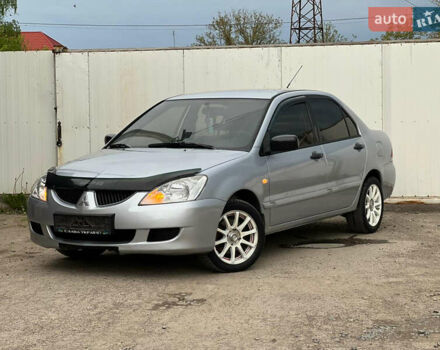Сірий Міцубісі Lancer, об'ємом двигуна 1.6 л та пробігом 310 тис. км за 3350 $, фото 4 на Automoto.ua