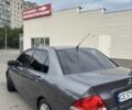 Серый Мицубиси Лансер, объемом двигателя 1.6 л и пробегом 177 тыс. км за 5000 $, фото 6 на Automoto.ua