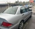 Сірий Міцубісі Lancer, об'ємом двигуна 1.6 л та пробігом 228 тис. км за 2850 $, фото 4 на Automoto.ua