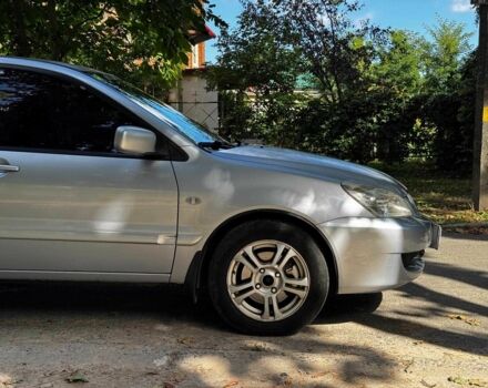 Серый Мицубиси Лансер, объемом двигателя 1.6 л и пробегом 196 тыс. км за 4390 $, фото 3 на Automoto.ua