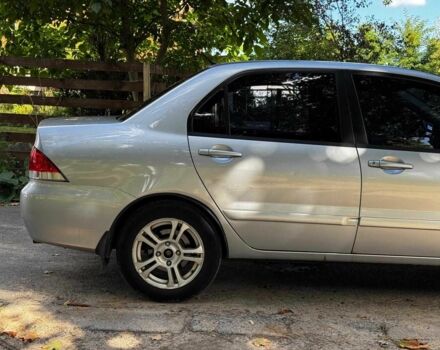 Серый Мицубиси Лансер, объемом двигателя 1.6 л и пробегом 196 тыс. км за 4390 $, фото 4 на Automoto.ua