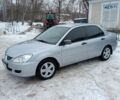 Серый Мицубиси Лансер, объемом двигателя 1.6 л и пробегом 227 тыс. км за 3400 $, фото 17 на Automoto.ua